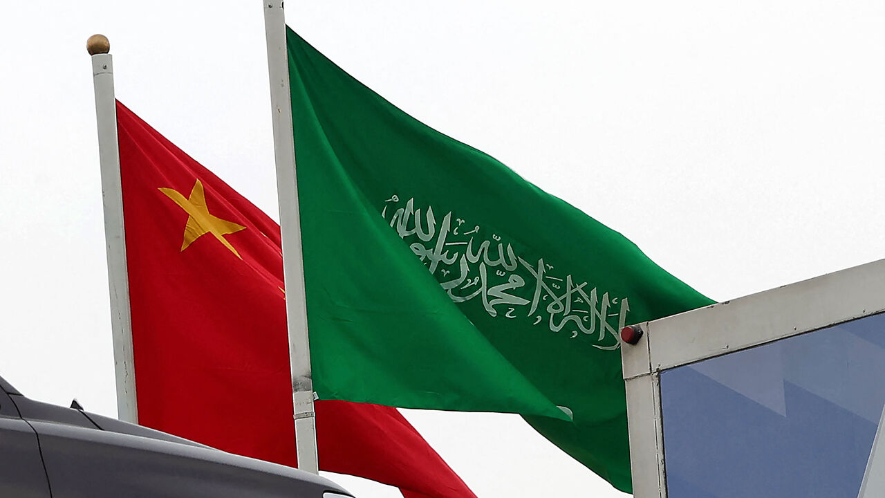 A picture taken on December 7, 2022 in Riyadh, shows the Chinese and the Saudi flags adorning a street ahead of the Chinese president's visit to the Saudi capital. - Chinese President Xi Jinping will make a three-day visit to Saudi Arabia this week, meeting the king and de facto ruler of the world's biggest oil exporter. (Photo by Fayez Nureldine / AFP) (Photo by FAYEZ NURELDINE/AFP via Getty Images)