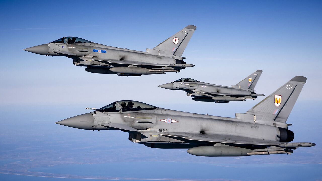 urofighter jet fighters from the United Kingdom fly over the North Sea.