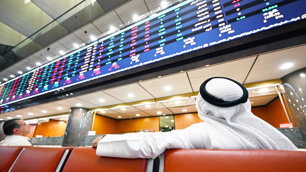 Kuwaiti traders follow the stock market activity at Boursa Kuwait, in Kuwait City, on April 7, 2025.
