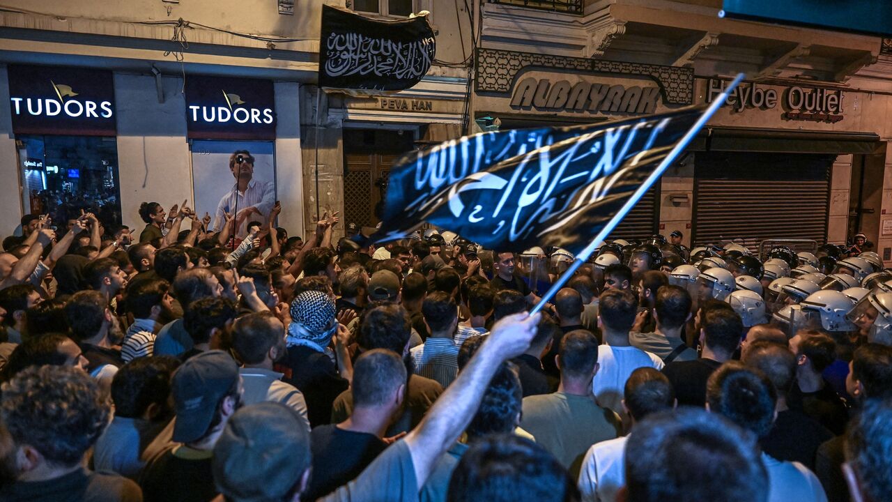 Islamist protesters clash with Turkish anti-riot police officers as they gather to protests LeMan cartoon magazine in Istanbul on June 30, 2025.