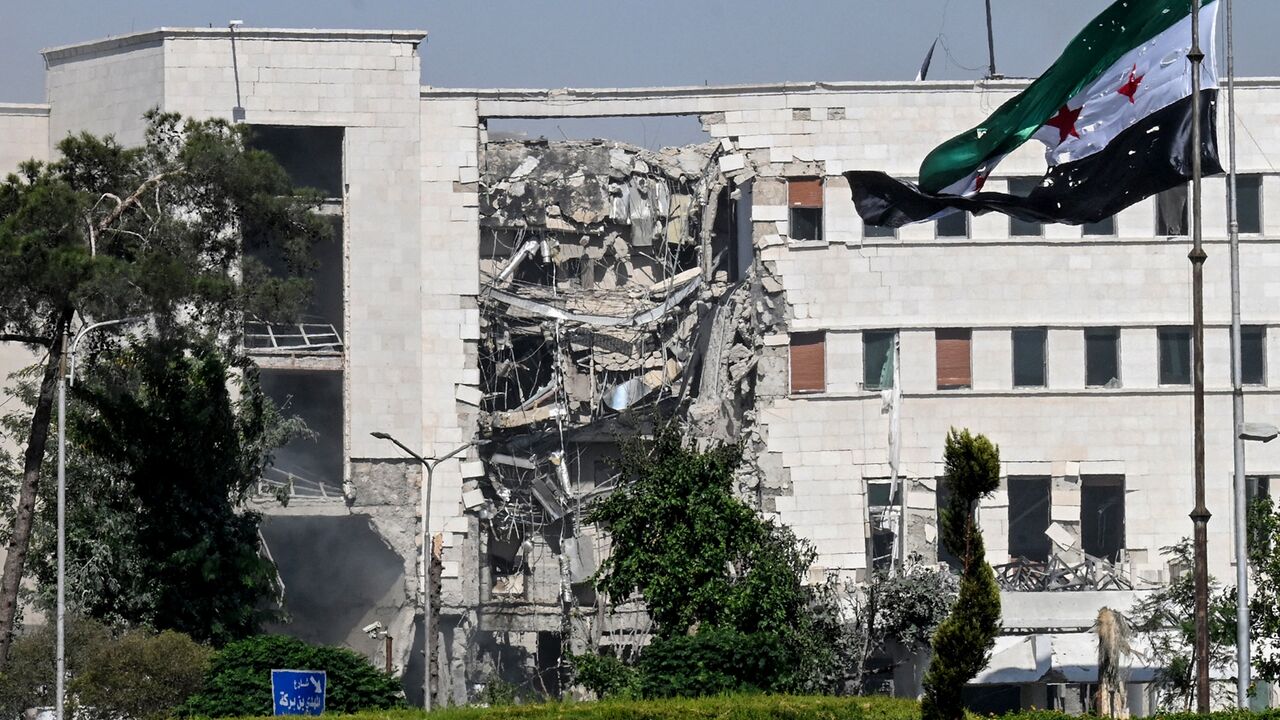 A picture shows a view of the damage following Israeli strikes on the Syrian army and Defense Ministry headquarters in Damascus, on July 16, 2025.