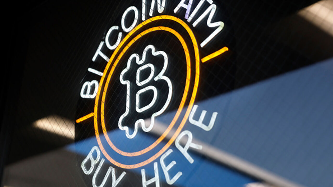 A sign advertises a Bitcoin ATM at a gas station on July 16, 2025 near Pasadena, California. (Mario Tama/Getty Images)
