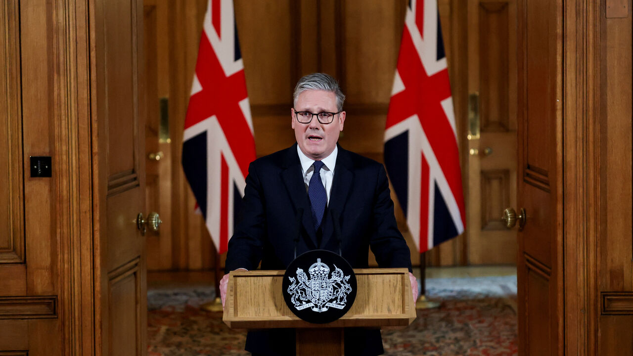 FILE PHOTO: Britain's Prime Minister Keir Starmer delivers a statement inside No. 10 Downing Street on the day the cabinet was recalled to discuss the situation in Gaza, in London, Britain, July 29, 2025. REUTERS/Toby Melville/Pool/File Photo