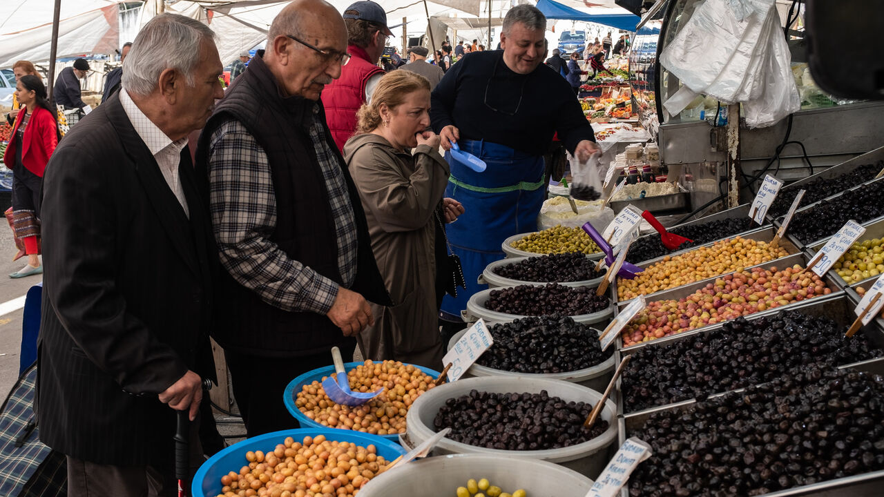 People shop at a local street market in Istanbul, Turkey, May 3, 2023.