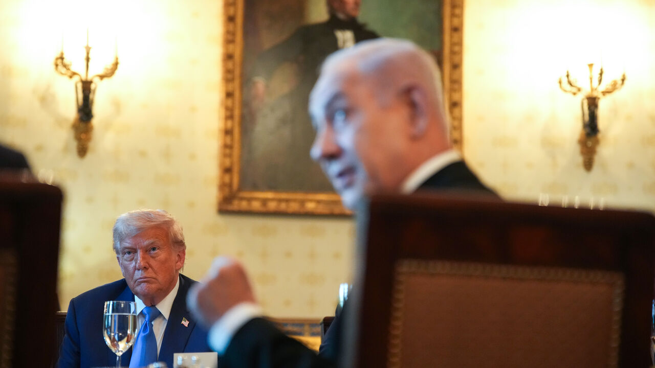 WASHINGTON, DC - JULY 07: U.S. President Donald Trump looks on as Israeli Prime Minister Benjamin Netanyahu speaks during a dinner in the Blue Room of the White House on July 07, 2025 in Washington, DC. Trump is hosting Netanyahu for a dinner as the two discuss a potential ceasefire agreement to end the fighting in Gaza. (Photo by Andrew Harnik/Getty Images)