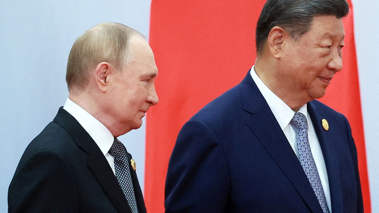 FILE PHOTO: Russian President Vladimir Putin and Chinese President Xi Jinping take part in a photo ceremony at the Shanghai Cooperation Organisation (SCO) summit in Tianjin, China, September 1, 2025. Sputnik/Vladimir Smirnov/Pool via REUTERS/File Photo