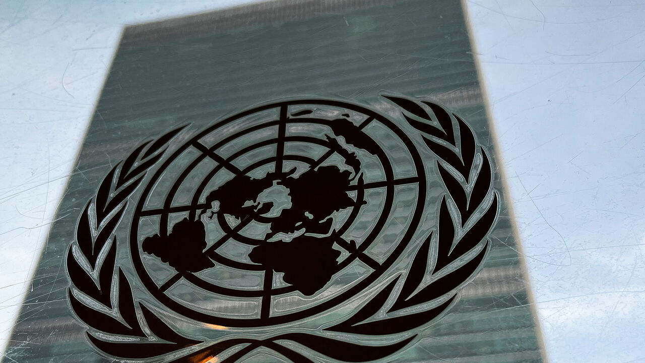 FILE PHOTO: The United Nations headquarters building is pictured with a UN logo in the Manhattan borough of New York City, New York, U.S., March 1, 2022.  REUTERS/Carlo Allegri/ File Photo