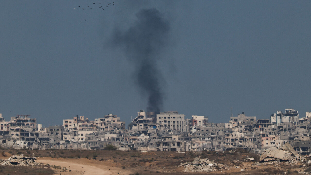 Smoke rises from Gaza as seen from the Israeli side of the border, September 29, 2025. REUTERS/Amir Cohen