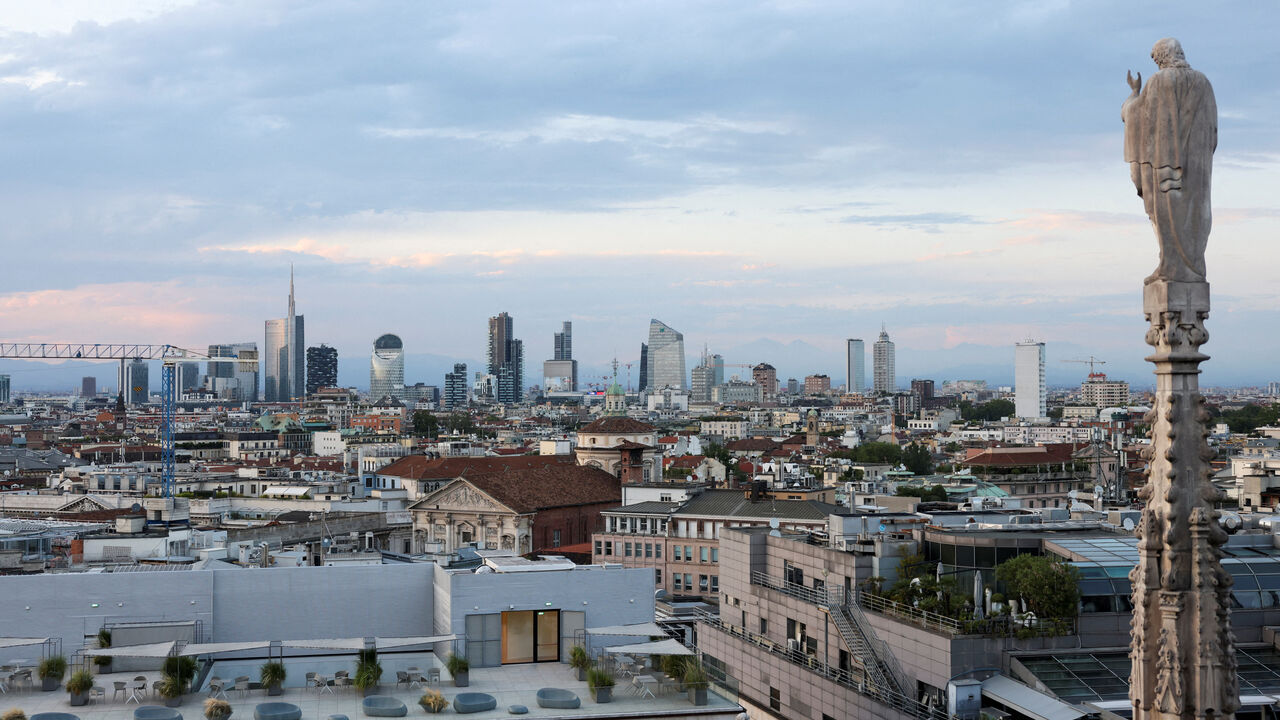A view shows Milan's skyline during sunset in Milan, Italy, July 6, 2023. REUTERS/Claudia Greco