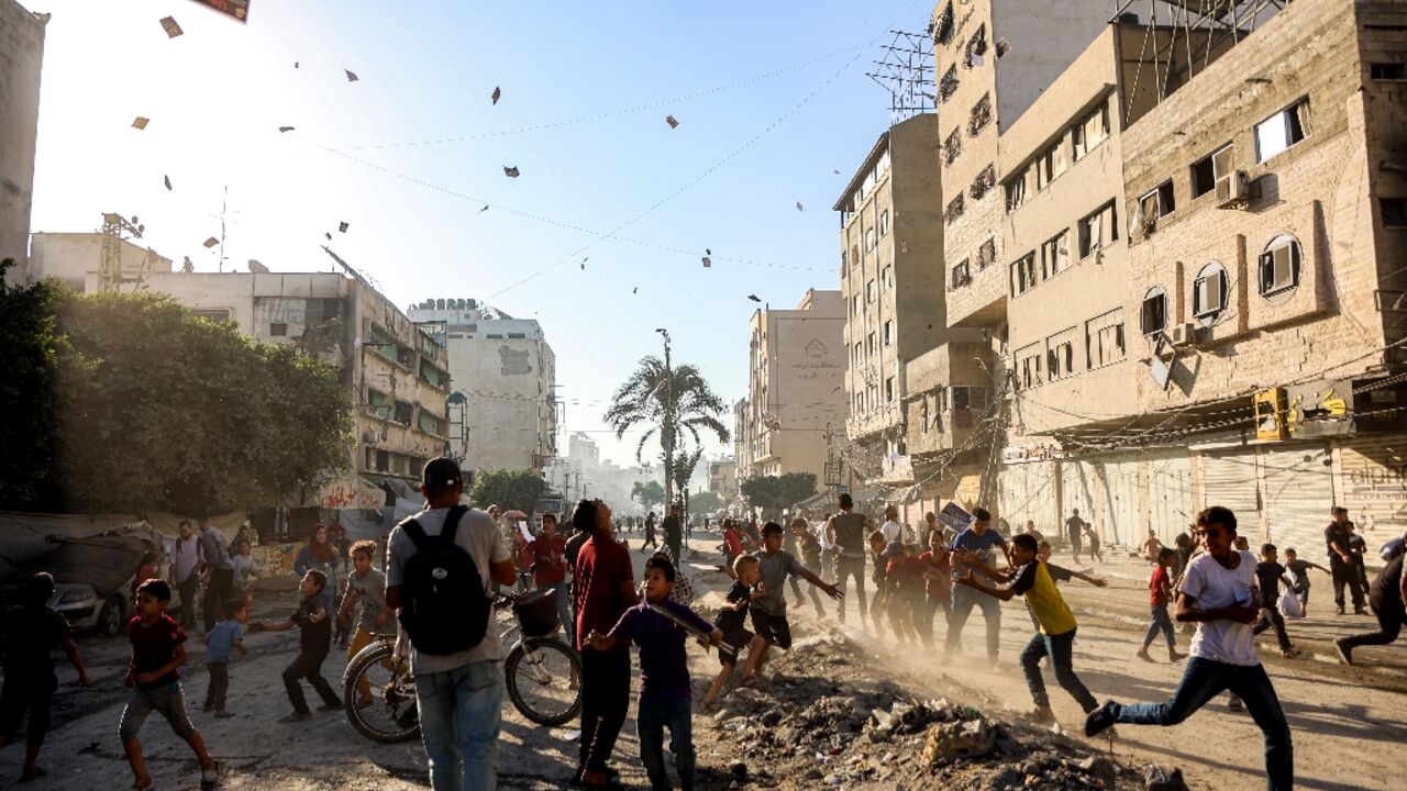Israeli planes dropped leaflets on Gaza City telling people to leave Israeli planes dropped leaflets on Gaza City telling people to leave