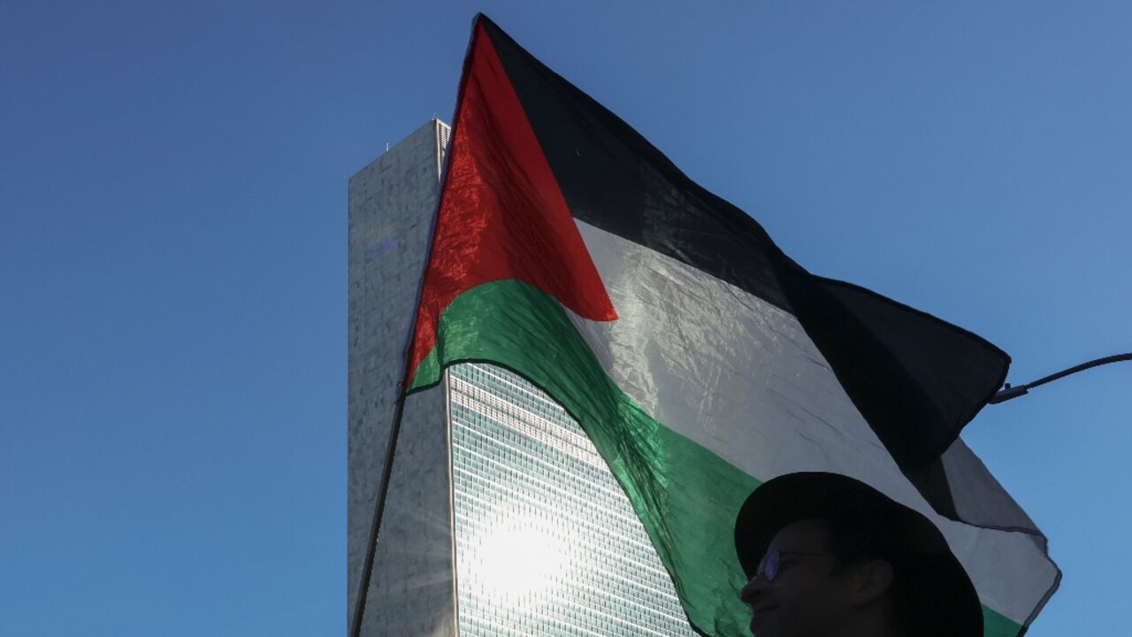 Pro-Palestinian protesters rallied outside United Nations headquarters ahead of the annual General Assembly, which opens Monday with a debate on recognising a state of Palestine Pro-Palestinian protesters rallied outside United Nations headquarters ahead of the annual General Assembly, which opens Monday with a debate on recognising a state of Palestine