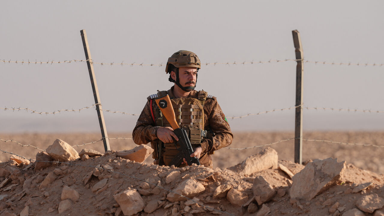 A member of the Iraqi security forces patrols the Iraq-Saudi Arabia border on Sept. 2, 2025.