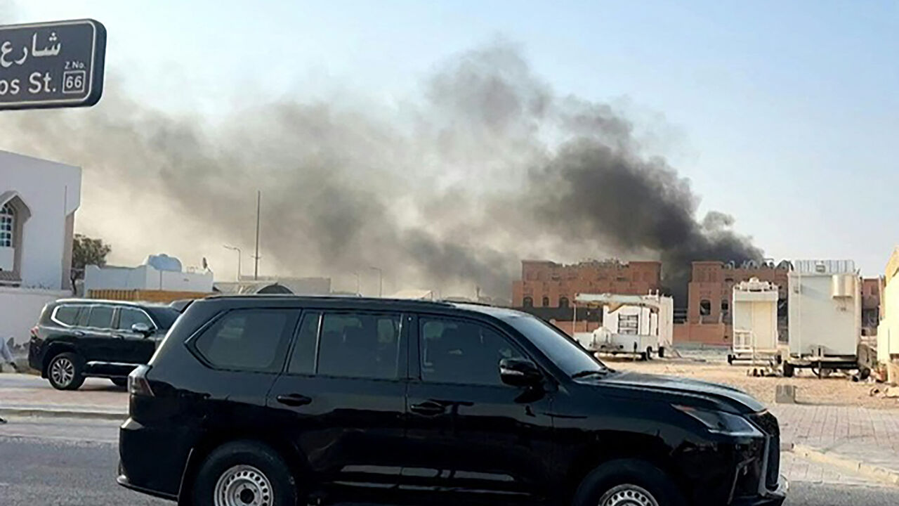 This frame grab taken from an AFPTV footage shows smoke billowing after explosions in Qatar's capital Doha on Sept. 9, 2025. 
