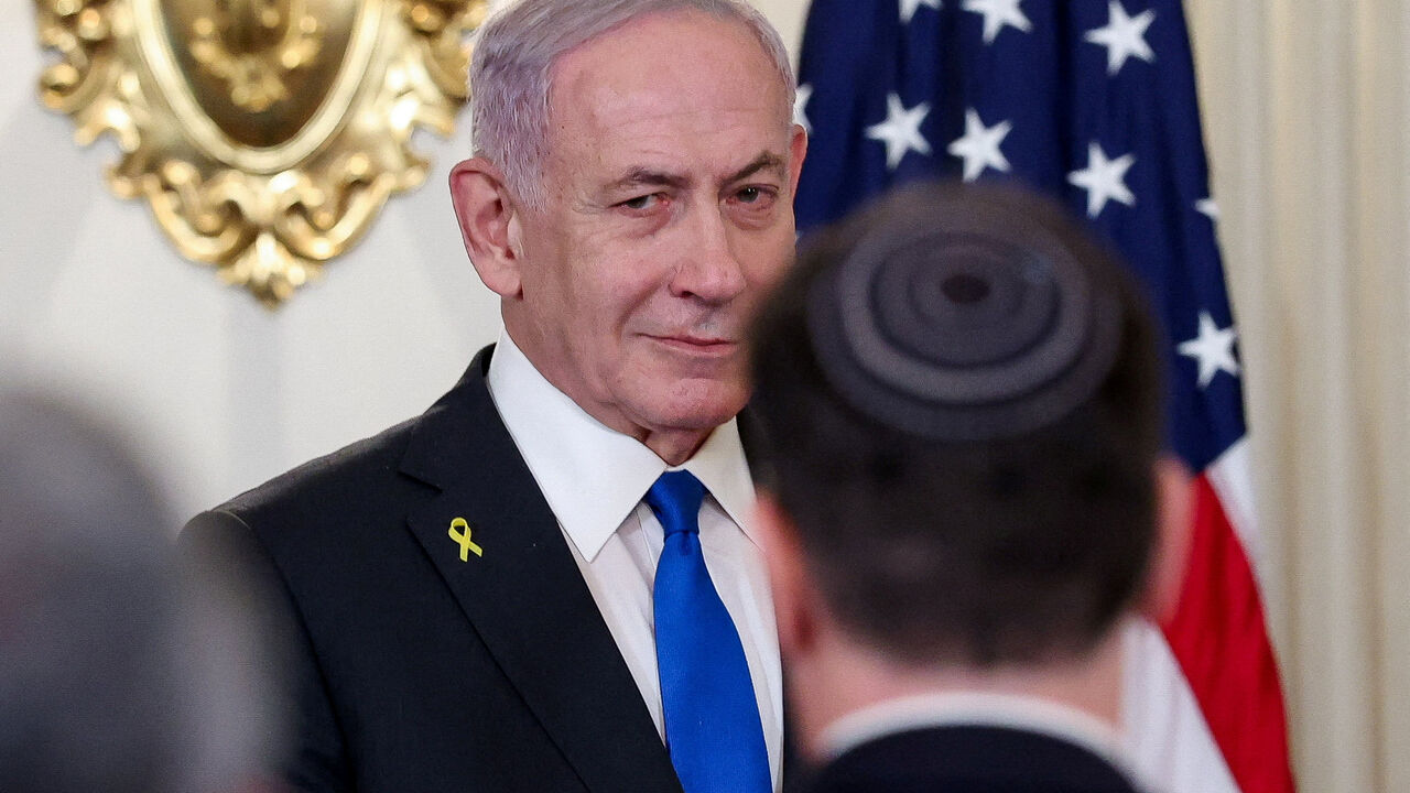 Israeli Prime Minister Benjamin Netanyahu arrives for a joint press conference with U.S. President Donald Trump (not pictured) in the State Dining Room at the White House in Washington, D.C., U.S., September 29, 2025. REUTERS/Jonathan Ernst