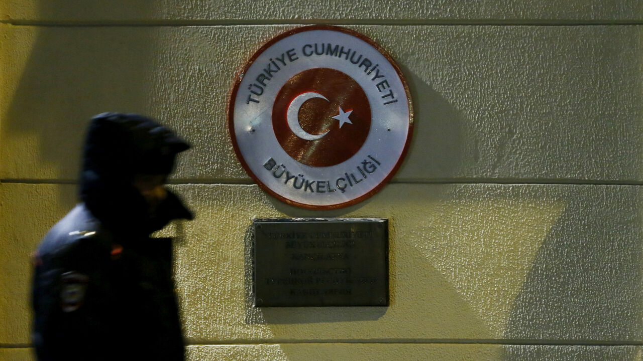 FILE PHOTO: A policeman stands guard in front of the Turkish embassy during a protest in reaction after a Russian war plane was shot down by Turkey, in Moscow, Russia, November 24, 2015.  REUTERS/Maxim Shemetov/File Photo