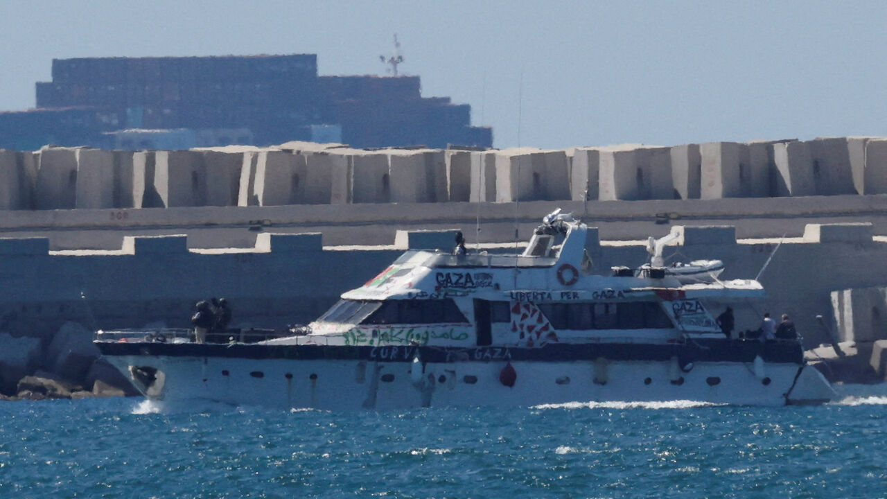 An intercepted vessel from the Global Sumud Flotilla moves towards Ashdod Port, after Israel intercepted some of the vessels of the Flotilla aiming to reach Gaza and break Israel's naval blockade, in southern Israel, October 2, 2025. REUTERS/Ammar Awad