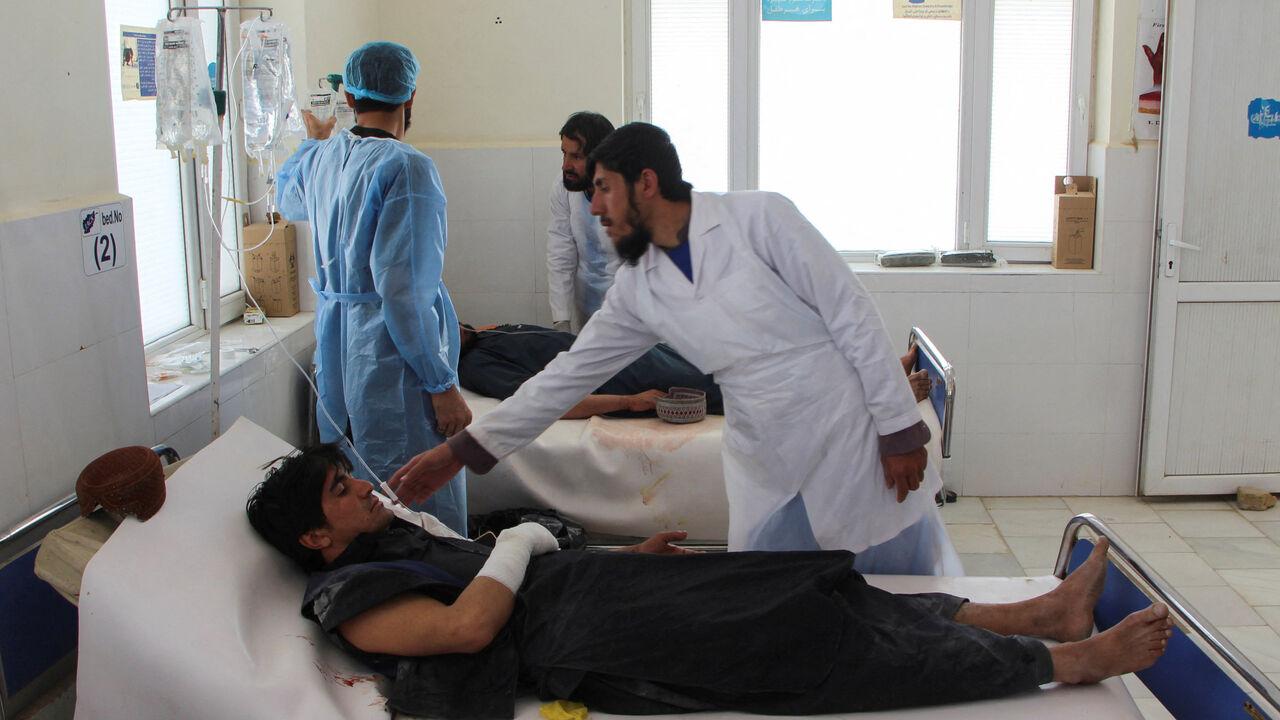 An injured Afghan man receives treatment at a hospital in Spin Boldak, Kandahar Province, following exchanges of fire between Pakistani and Afghan forces in Afghanistan, October 15, 2025. REUTERS/Stringer
