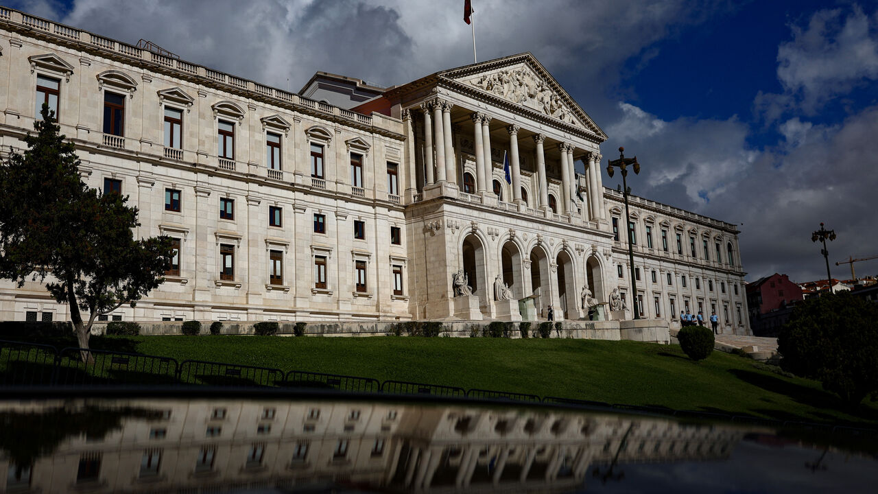 A view of the Portuguese parliament and its reflection on the day Portugal's Finance Minister Joaquim Miranda Sarmento is expected to submit the 2025 budget draft to parliament, in Lisbon, Portugal, October 10, 2024. REUTERS/Pedro Nunes