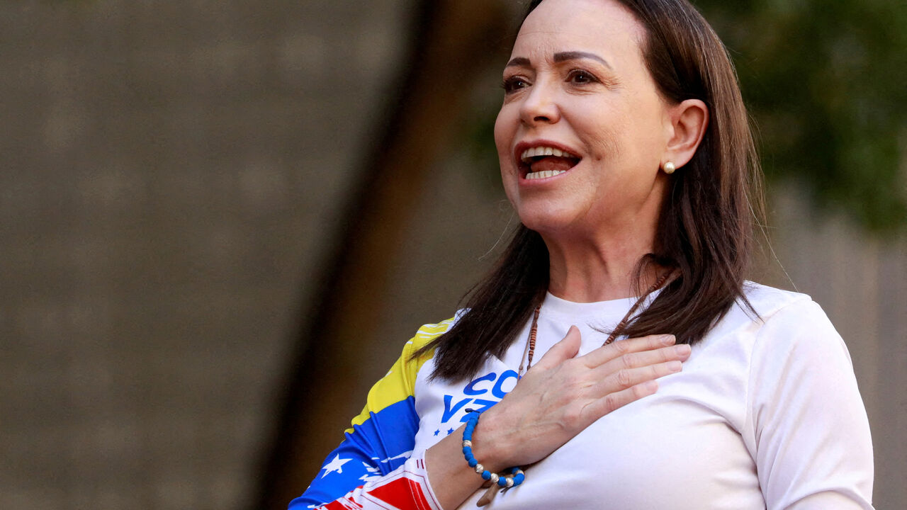 FILE PHOTO: Venezuelan opposition leader Maria Corina Machado gestures at a protest ahead of the Friday inauguration of President Nicolas Maduro for his third term, in Caracas, Venezuela January 9, 2025. REUTERS/Leonardo Fernandez Viloria/File Photo