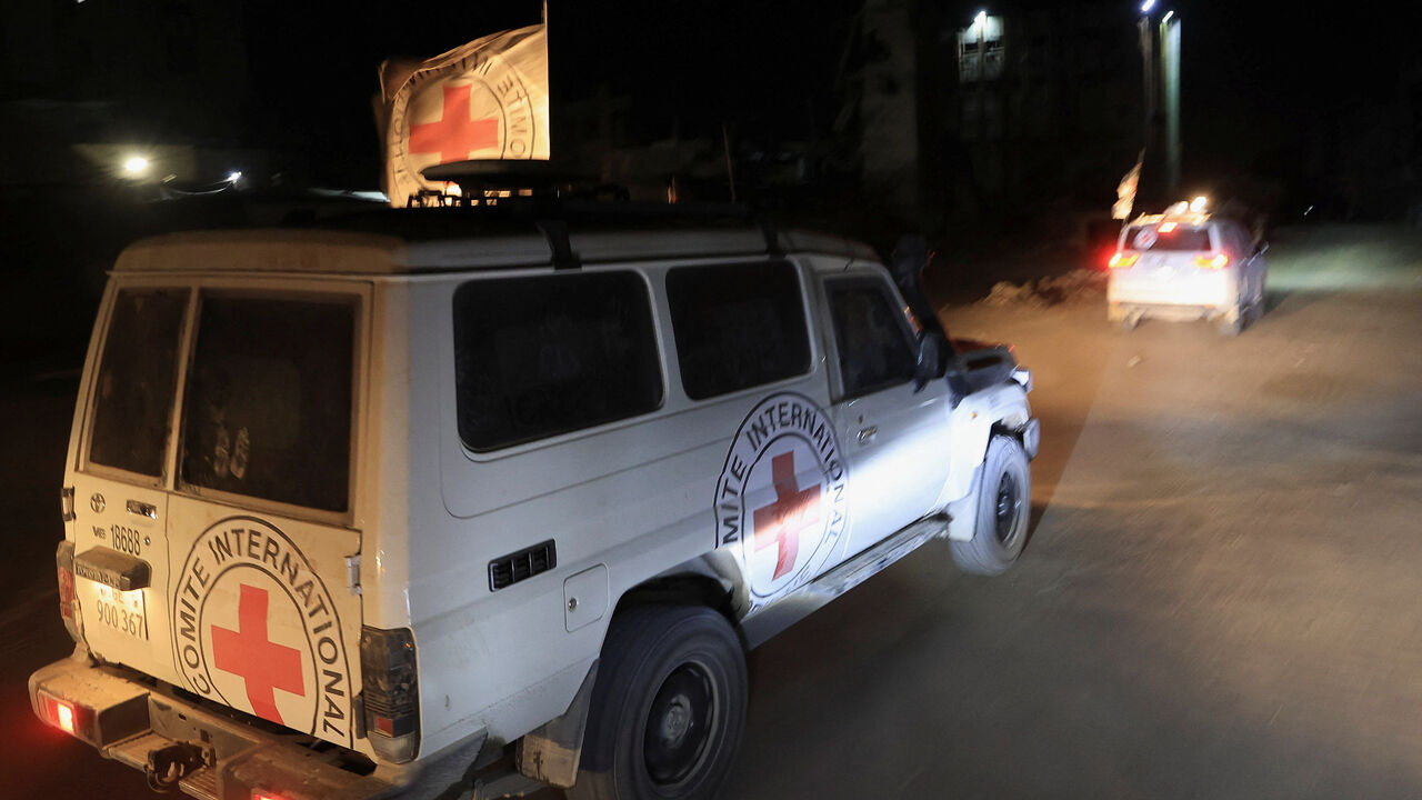 Red Cross transports the body of a deceased hostage, who had been held in Gaza since the deadly October 7, 2023, attack, after it was handed over by Hamas militants as part of a ceasefire and a hostages-prisoners swap deal between Hamas and Israel, in Gaza City, October 27, 2025. REUTERS/Dawoud Abu Alkas