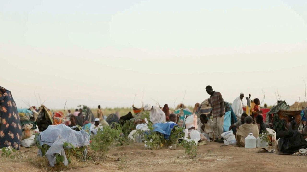 Displaced Sudanese gather and sit in makeshift tents after fleeing Al-Fashir city in Darfur, in Tawila, Sudan, October 29, 2025, in this still image taken from a Reuters' video. REUTERS/Mohamed Jamal