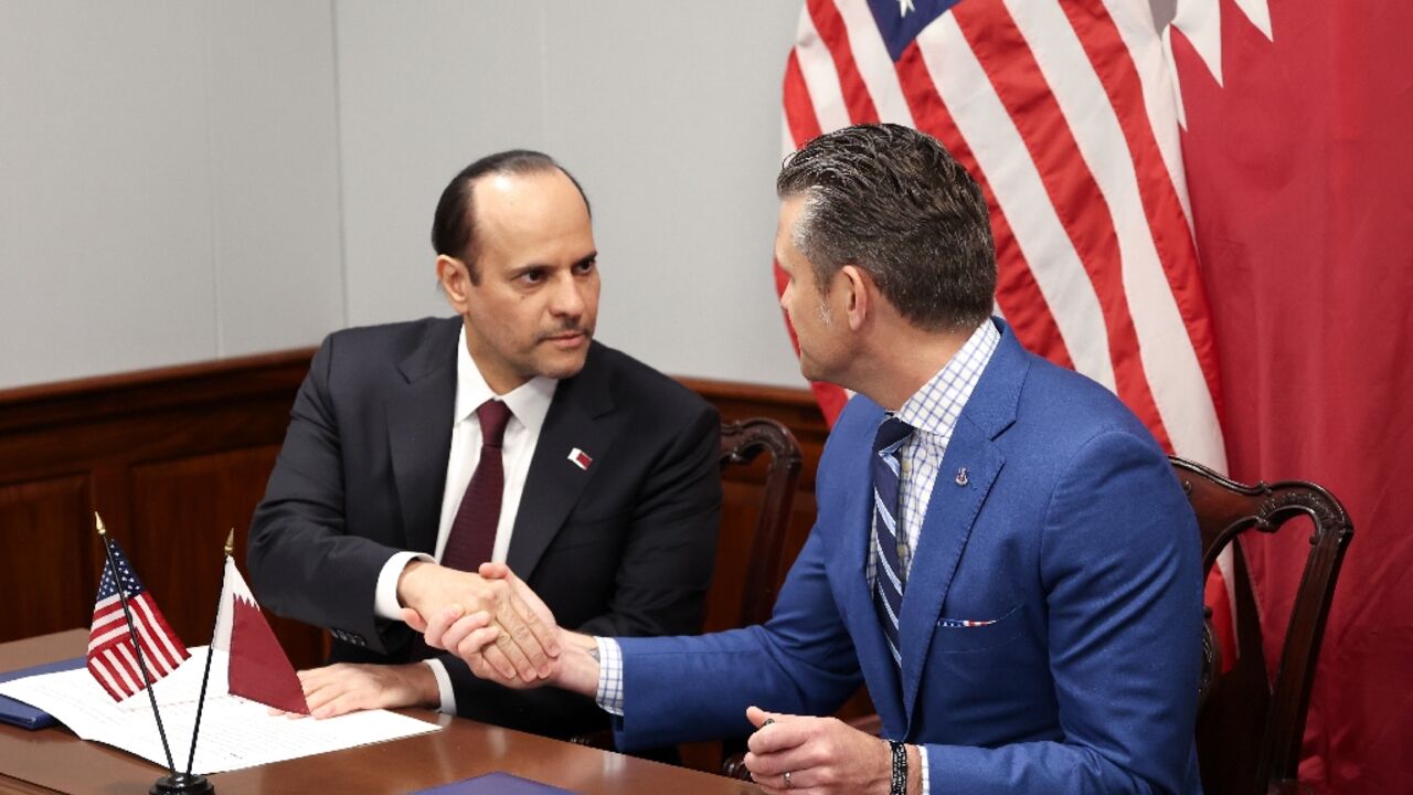 US Defense Secretary Pete Hegseth (R) and Qatari Defense Minister Sheikh Saoud bin Abdulrahman Al Thani shake hands after signing a deal to establish a Qatari Emiri Air Force training facility at the Mountain Home Air Force Base in Idaho US Defense Secretary Pete Hegseth (R) and Qatari Defense Minister Sheikh Saoud bin Abdulrahman Al Thani shake hands after signing a deal to establish a Qatari Emiri Air Force training facility at the Mountain Home Air Force Base in Idaho
