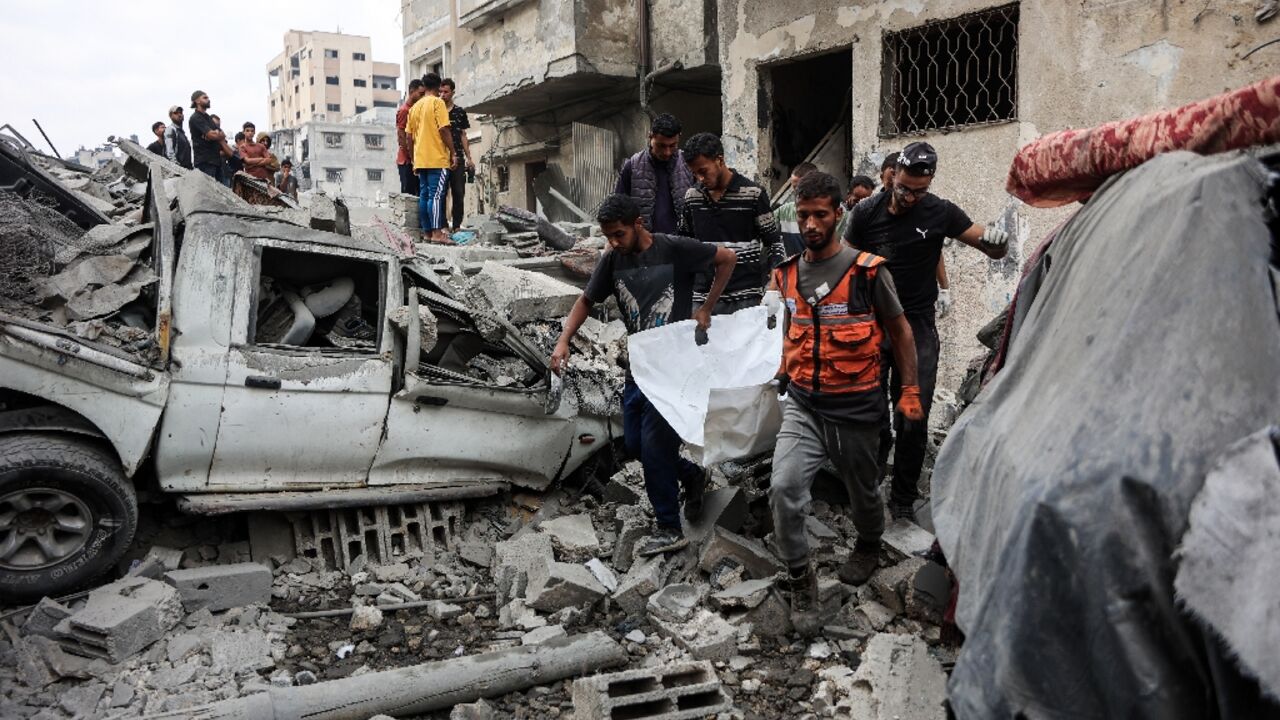 Palestinians are recovering more bodies from the ruins of gaza after Israel launched another series of air strikes in response to the killing of a soldier