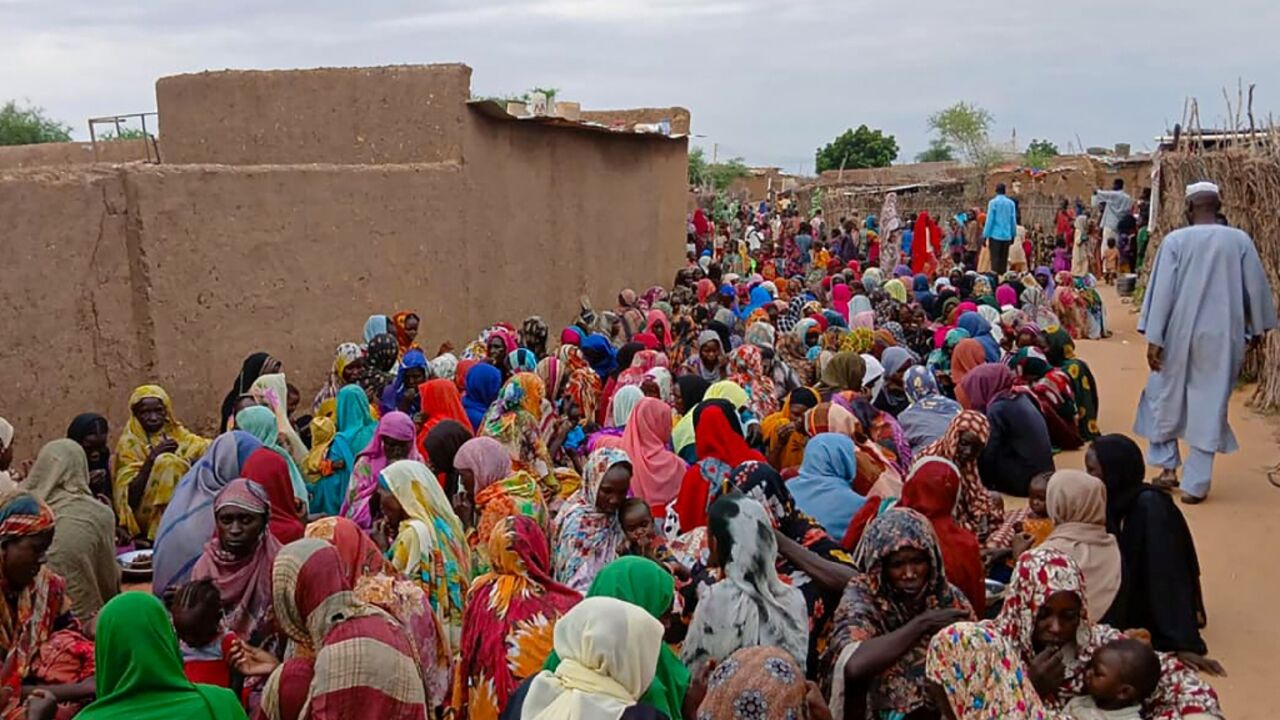 A file picture from August of people gathering to receive food in Sudan's El-Fasher, which has been under siege since 2023  A file picture from August of people gathering to receive food in Sudan's El-Fasher, which has been under siege since 2023