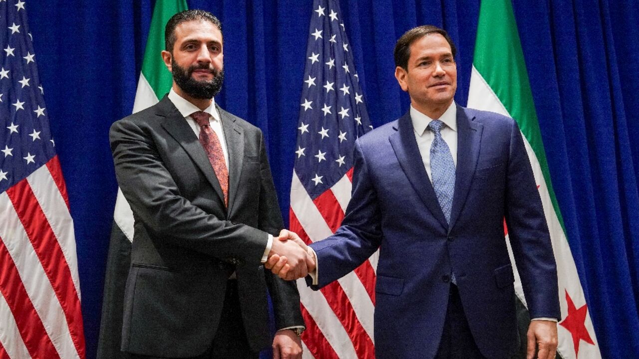 Syrian President Ahmed al-Sharaa meets top US diplomat Marco Rubio (R) 
on the sidelines of the United Nations General Assembly meeting in New York on September 22, 2025