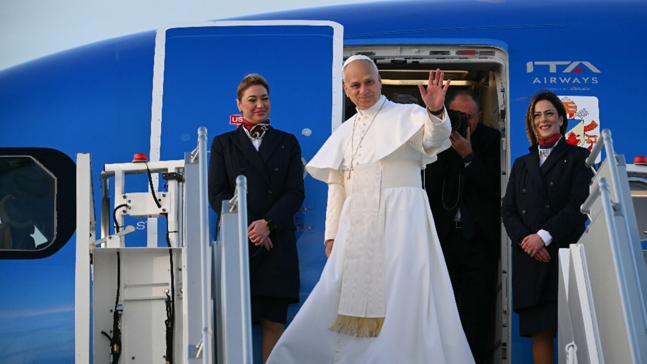 Pope Leo XIV, seen here boarding the plane for Ankara, said he was 'very much looking foward' to his trip to Turkey 