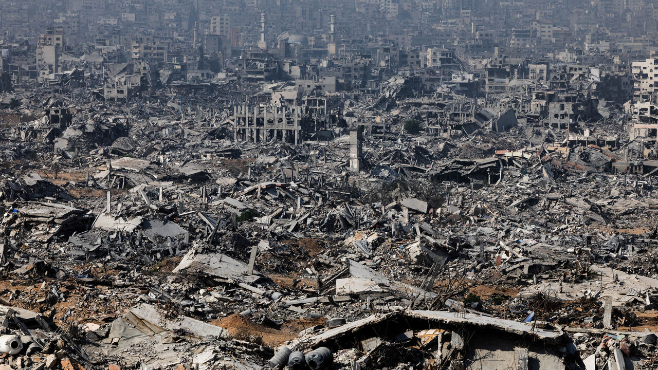 Destroyed buildings as seen from an Israeli military outpost within the borders of the 'yellow line' in the Shujaiya neighborhood in the eastern part of Gaza City, in the Gaza Strip, November 5. REUTERS/Nir Elias
