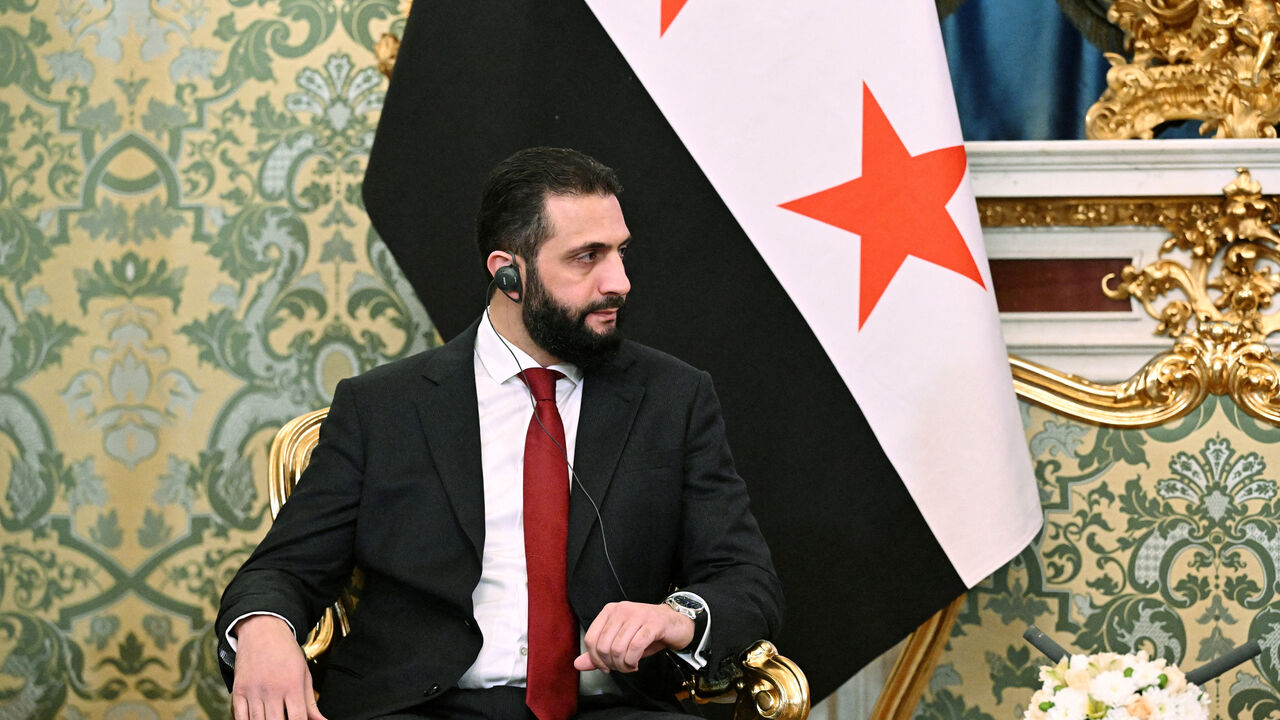 FILE PHOTO: Syria's President Ahmed al-Sharaa attends a meeting with Russia's President Vladimir Putin in Moscow, Russia, October 15, 2025. Sputnik/Sergey Bobylyov/Pool via REUTERS