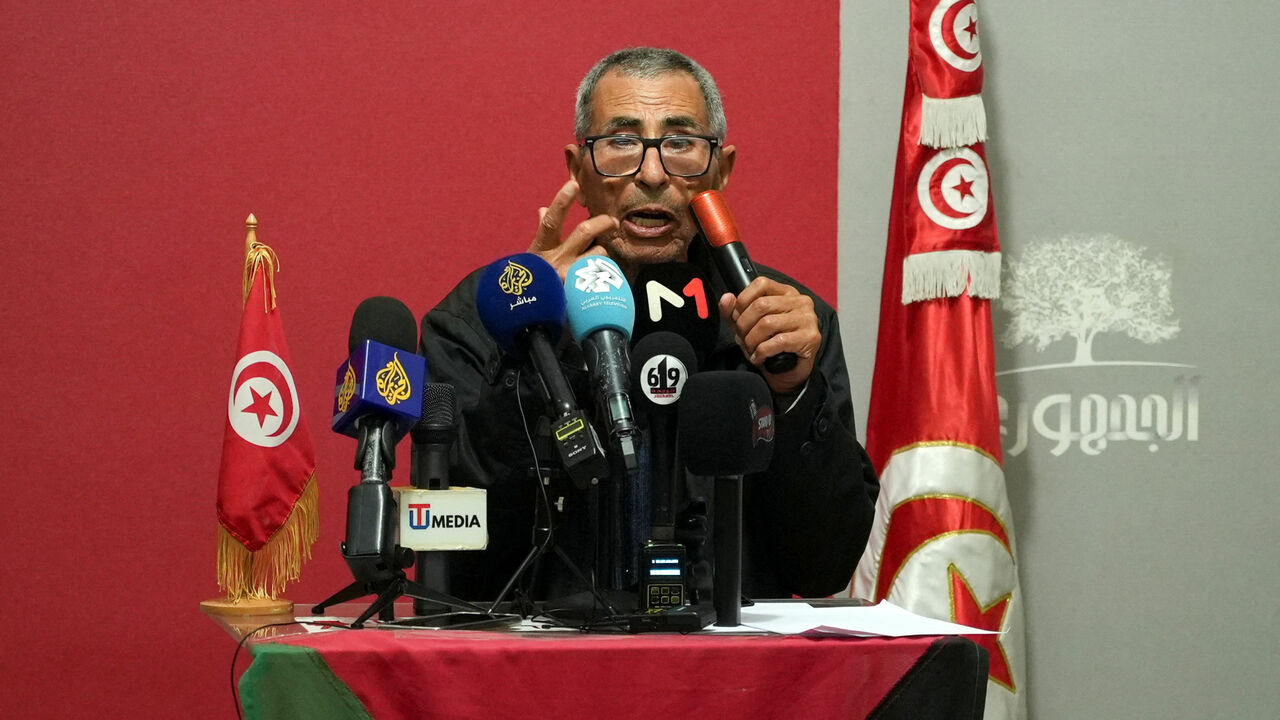 Father of jailed Tunisian opposition leader Jawhar Ben Mbarek, Ezzedine Hazgui, speaks during a press conference after the family and lawyers accused prison authorities on Wednesday of brutally assaulting Mbarek in an attempt to force an end to his two-week-old hunger strike, in Tunis, Tunisia, November 12, 2025. REUTERS/Jihed Abidellaoui