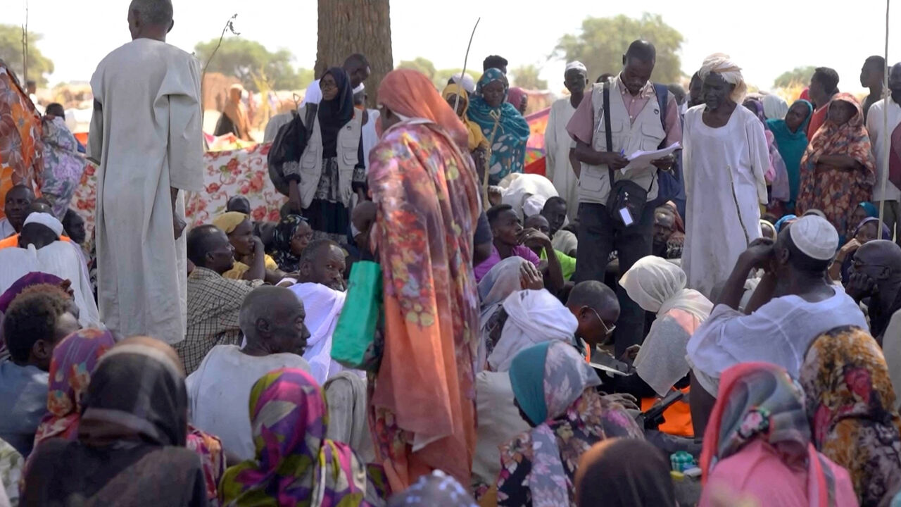 FILE PHOTO: Displaced Sudanese gather after fleeing Al-Fashir city in Darfur, in Tawila, Sudan, October 29, 2025, in this still image taken from a Reuters' video. REUTERS/Mohamed Jamal/File Photo