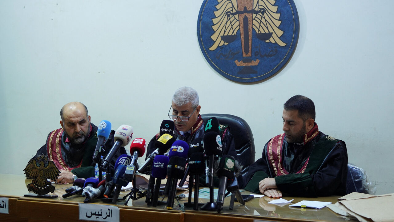 A judge speaks during the trial at the Palace of Justice, as Syria began the trial of a first group drawn from hundreds of defendants allegedly involved in the mass killings of Alawites last March, in Aleppo, Syria, November 18, 2025. REUTERS/Karam al-Masri