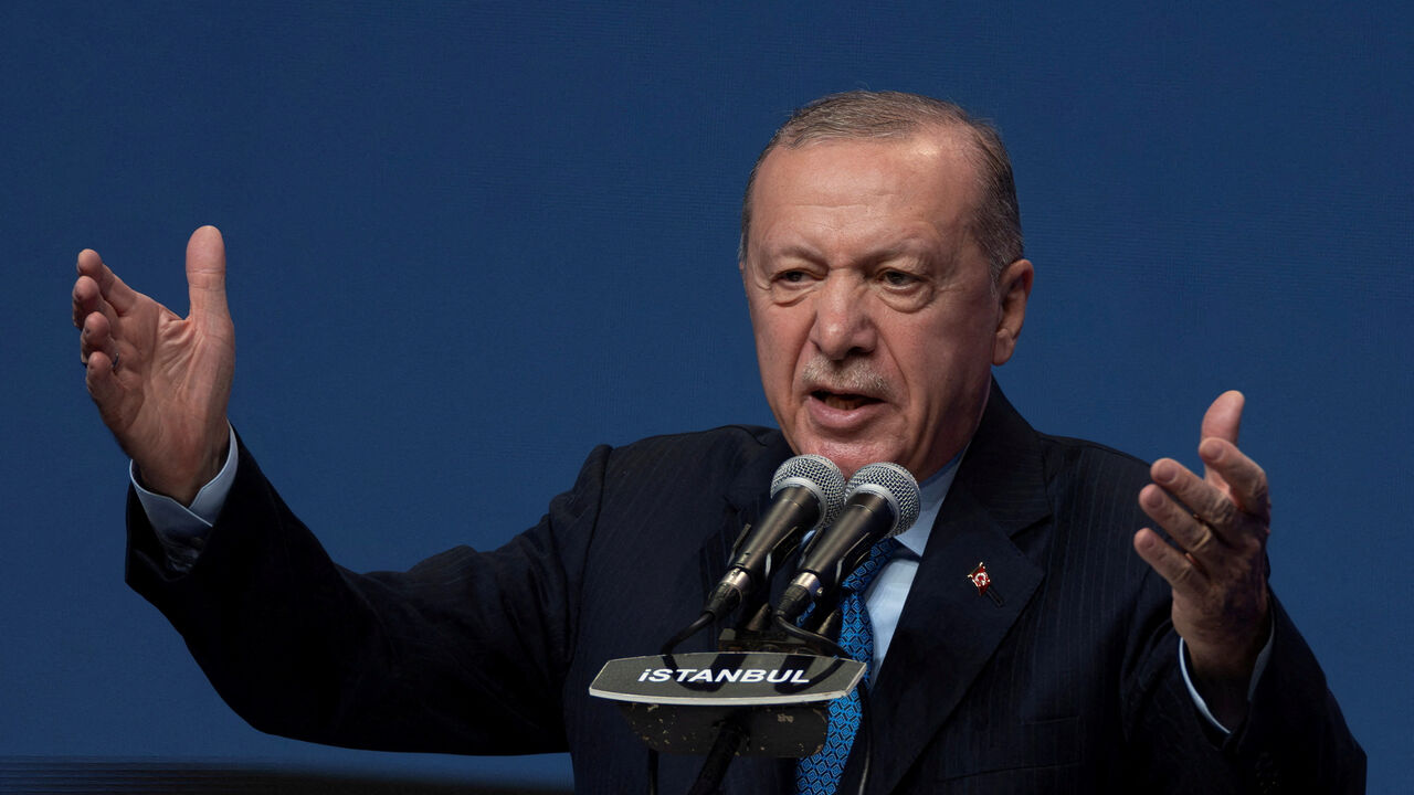 FILE PHOTO: Turkish President Tayyip Erdogan addresses his supporters during a meeting in Istanbul, Turkey, September 13, 2025. REUTERS/Umit Bektas/File Photo