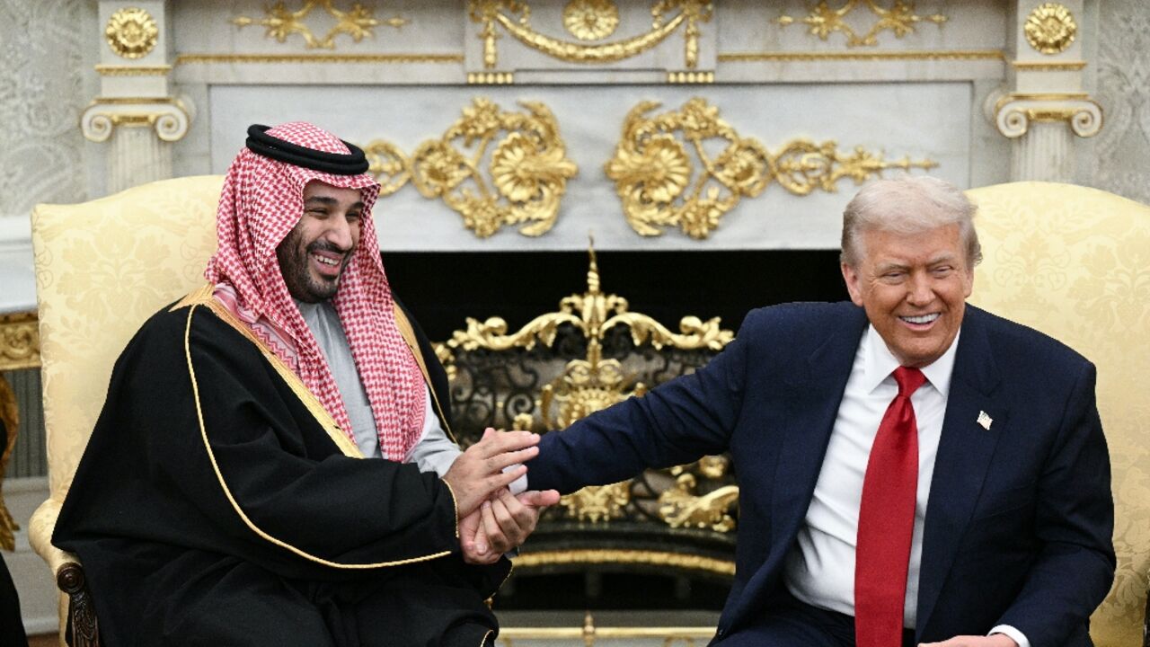 President Donald Trump joked about hand shakes and fist pumps with Saudia Arabia's Crown Prince Mohammed bin Salman during a meeting in the Oval Office