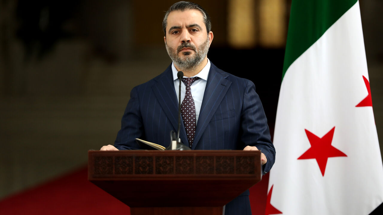 DAMASCUS, SYRIA - DECEMBER 30: Syria's newly appointed Foreign Minister Asaad Hassan al-Shibani during a press conference after a meeting between the Syrian leadership and a Ukrainian delegation to help strengthen ties between the two countries on December 30, 2024 in Damascus, Syria. Syria is transitioning after the fall of the Baath regime and the Assad family's rule, with a temporary administration now in place in Damascus and Aleppo. (Photo by Ali Haj Suleiman/Getty Images)