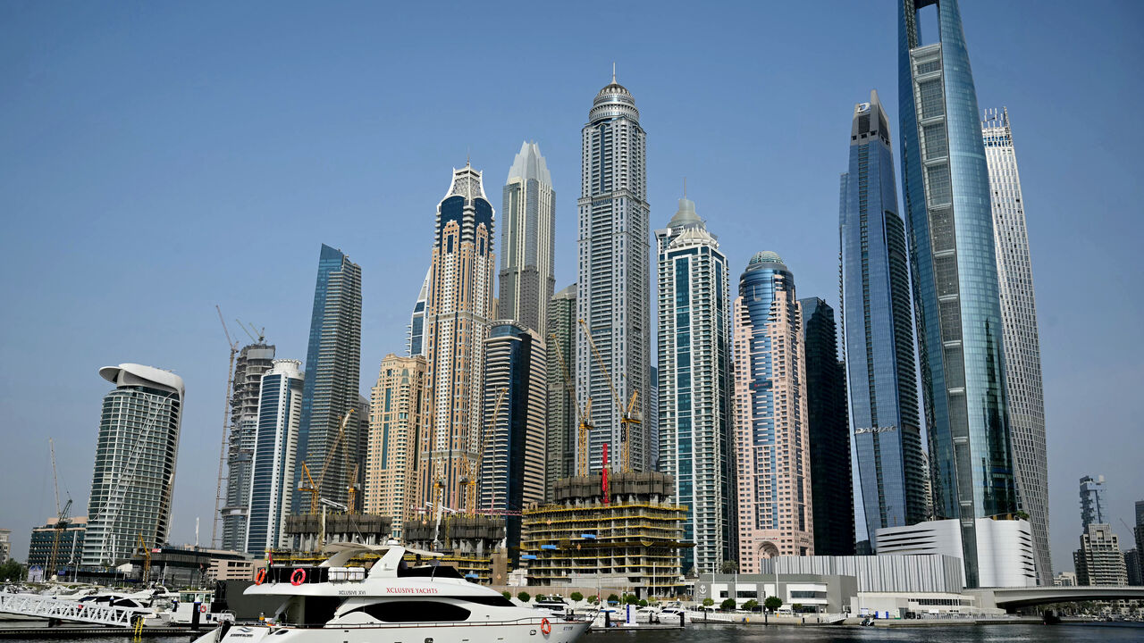 A yacht is pictured at the Dubai Marina in Dubai August 6, 2025. (Photo by Giuseppe CACACE / AFP) (Photo by GIUSEPPE CACACE/AFP via Getty Images)