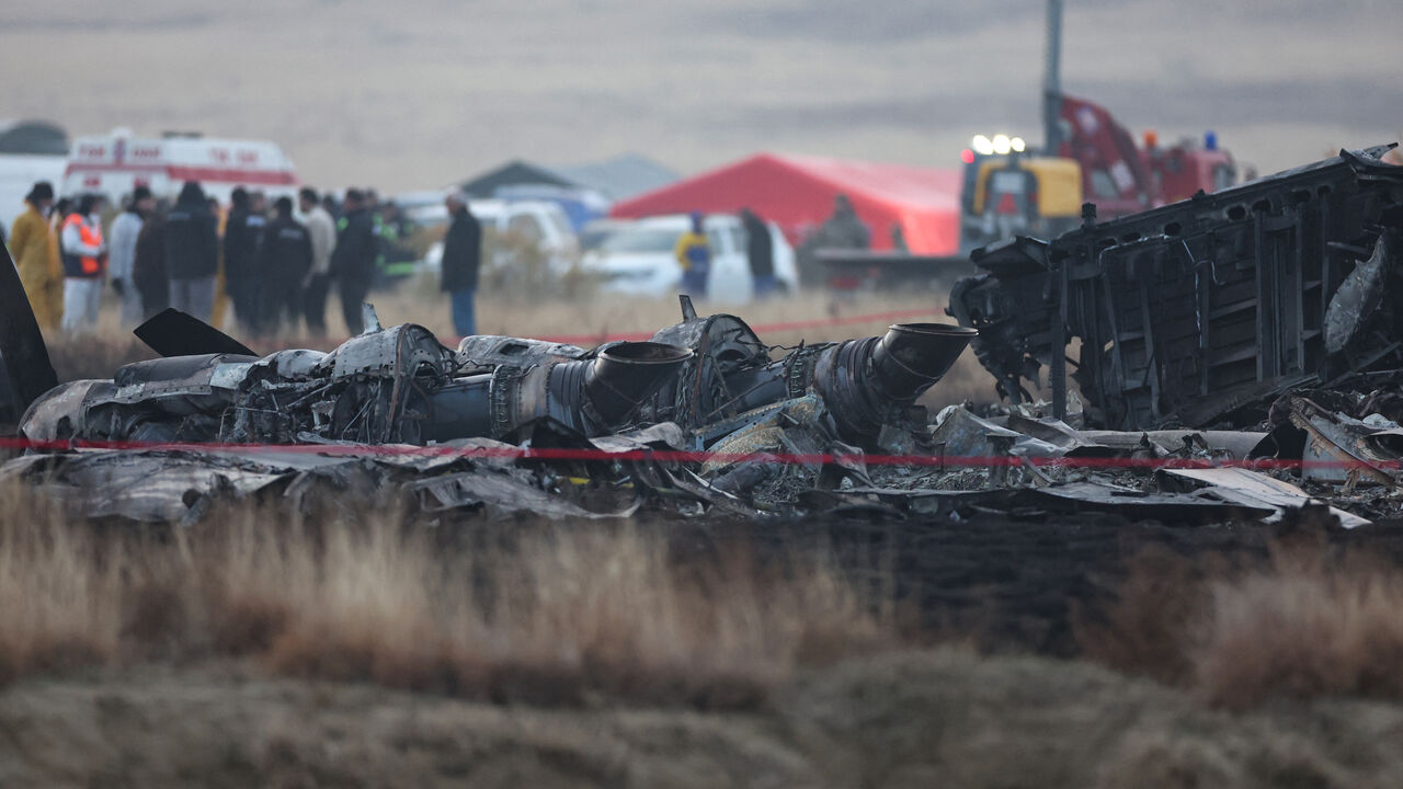 Wreckage is seen at the crash site of the Turkish C-130 military cargo plane in the Sighnaghi area at the Georgia-Azerbaijan border on November 12, 2025. A Turkish military cargo plane carrying 20 passengers and crew crashed in Georgia on its way home from Azerbaijan, the defence ministry said Tuesday. (Photo by Giorgi ARJEVANIDZE / AFP) (Photo by GIORGI ARJEVANIDZE/AFP via Getty Images)