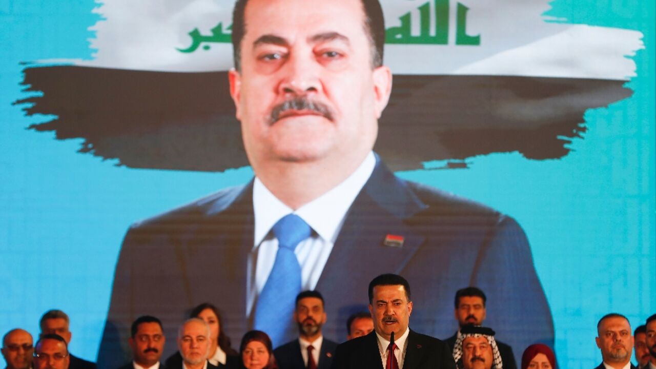 Iraq's Prime Minister Mohammed Shia al-Sudani delivers a speech during a campaign rally in Baghdad for the Reconstruction and Development Coalition ahead of the country's parliamentary elections