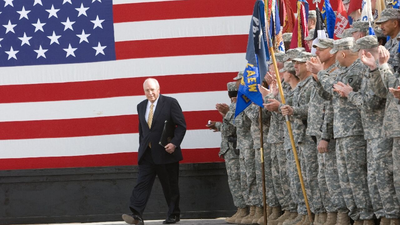 US Vice President Dick Cheney takes to the stage on March 18, 2008 to deliver remarks to US troops stationed at Balad Air Base, Iraq