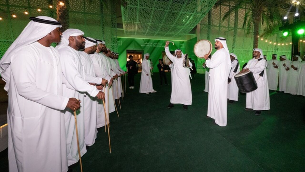Traditional Emirati dancers and musicians for the opening night of Abu Dhabi Art.