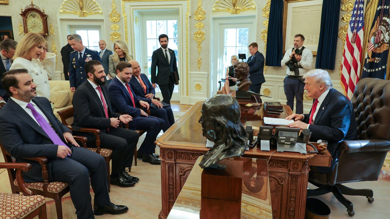 Syrian Foreign Minister Asaad al-Shibani, President Ahmed al-Sharaa, US Vice President JD Vance and US Turkey envoy Tom Barrack (seated L-R) are pictured in the Oval Office meeting with US President Donald Trump on Nov. 10, 2025. (Syrian Presidency)