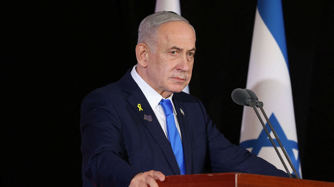 FILE PHOTO: Israeli Prime Minister Benjamin Netanyahu participate in the state memorial ceremony for the fallen of the Iron Swords War on Mount Herzl. In Jerusalem on 16 October 2025    Alex Kolomoisky/POOL/Pool via REUTERS/ File Photo