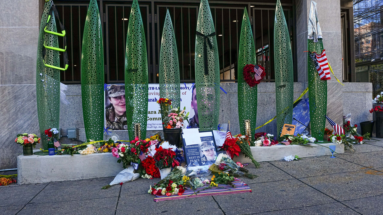 A makeshift memorial at the site of a shooting of two National Guard members in Washington, U.S., December 1, 2025. REUTERS/Aaron Schwartz