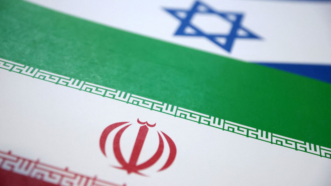 Israel and Iran flags are seen in this illustration taken June 18, 2025. REUTERS/Dado Ruvic/Illustration