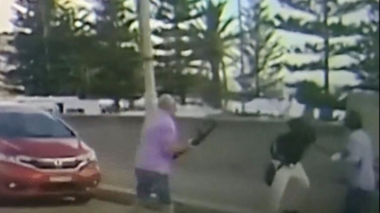 A recording of a footage shows a man holding the gun of one of the gunman of the deadly shooting incident at Bondi Beach after trying to disarm him, in Sydney, Australia, December 14, 2025, in this screengrab obtained from a social media video. JENNY/via REUTERS
