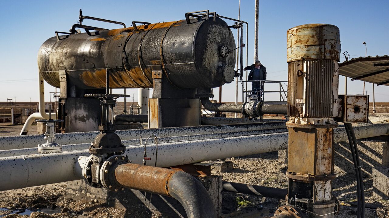An employee works at the Rmailan oil field in the northeastern Syria, near the border with Turkey, on Jan. 8, 2025.