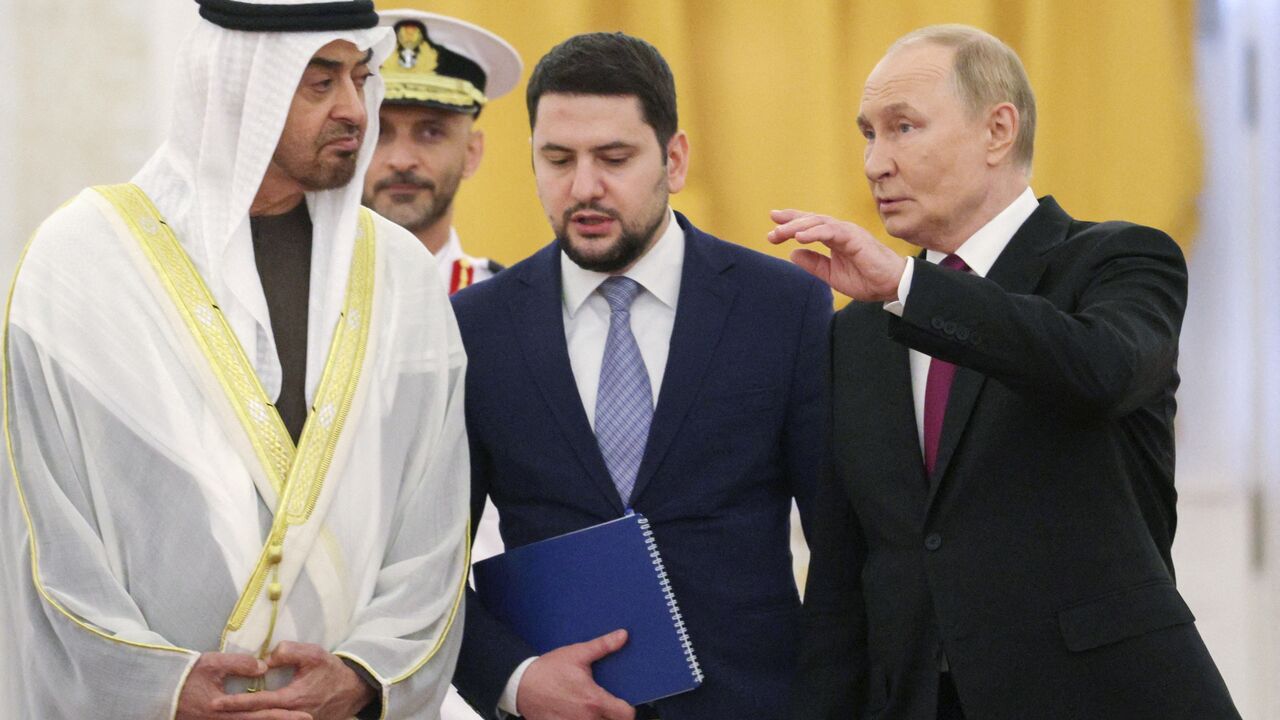 In this pool photograph distributed by the Russian state agency Sputnik, Russia's President Vladimir Putin and Emirati President Sheikh Mohamed bin Zayed Al Nahyan walk at the Kremlin following their talks in Moscow on August 7, 2025. (Photo by Gavriil Grigorov / POOL / AFP) (Photo by GAVRIIL GRIGOROV/POOL/AFP via Getty Images)